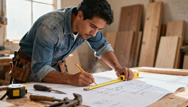 Carpenter studying plans with tools on a workbench