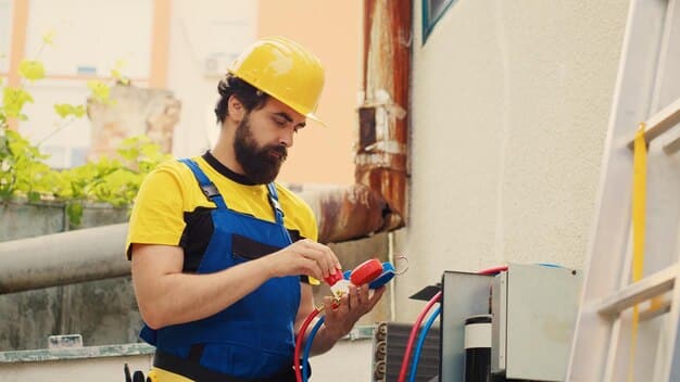 HVAC technician adjusting pressure on an air conditioning system
