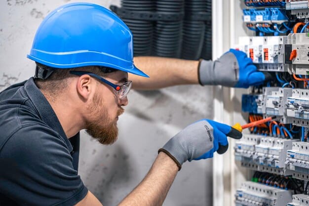 Electrician learning switchboard installation — Second Act Trades